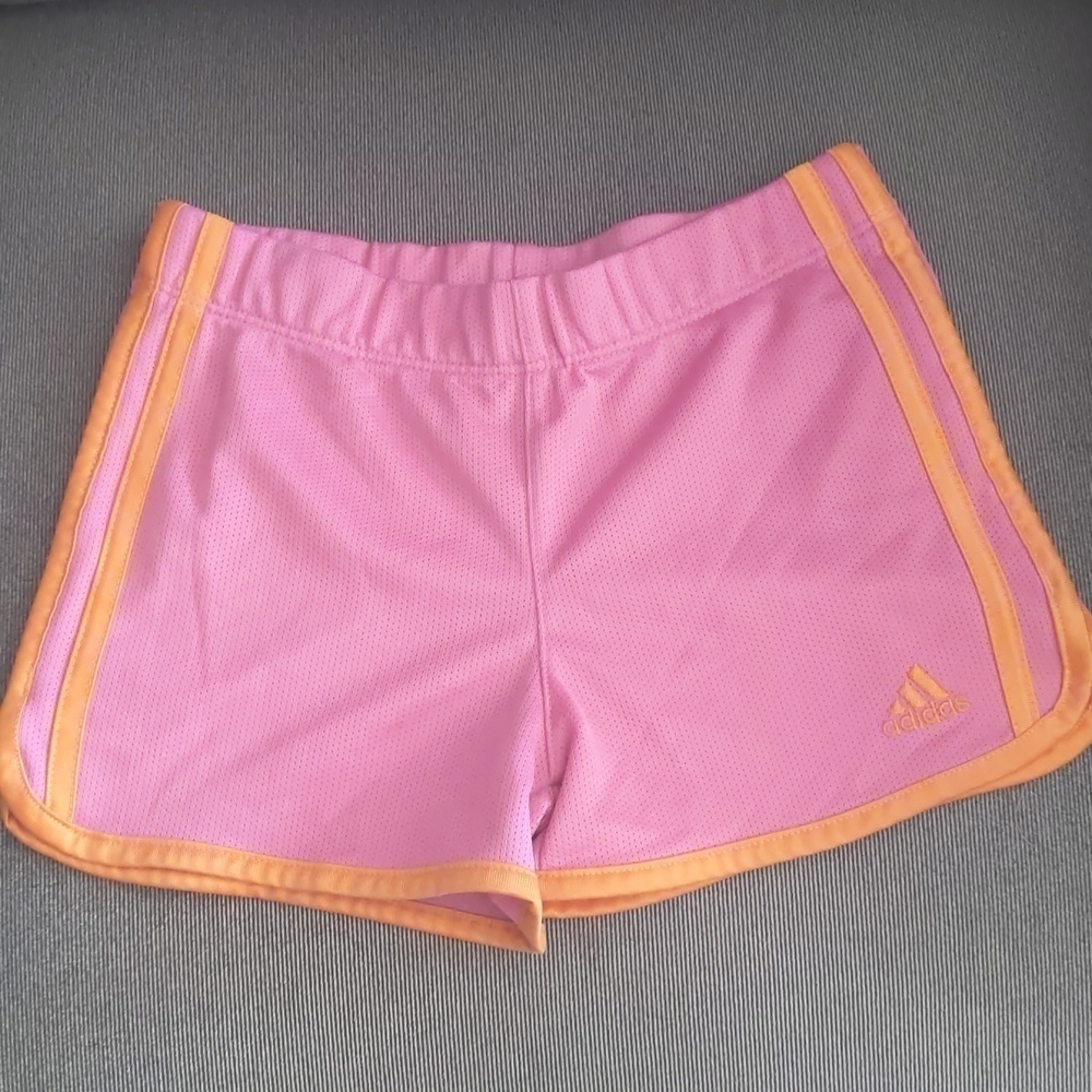 Girl's Adidas shorts size 6. Orange and pink.